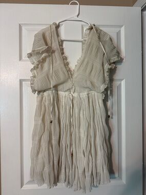 the clothing company Cream Pleated Midi Dress